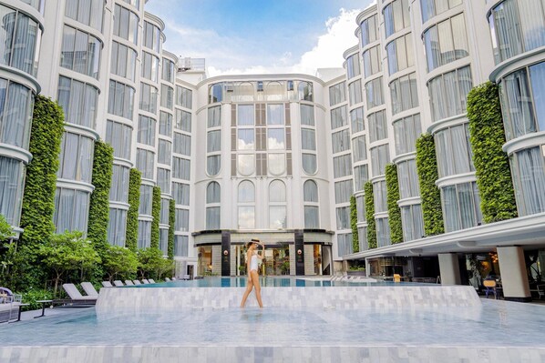 Outdoor pool, open 7:00 AM to 8:00 PM, pool umbrellas, sun loungers
