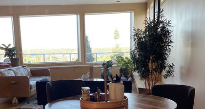 B&B with 2 rooms, a guest washroom, private media room, shared living & kitchen.