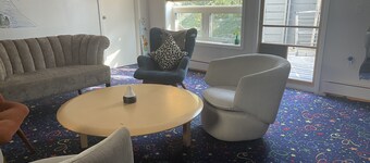 B&B with 2 rooms, a guest washroom, private media room, shared living & kitchen.