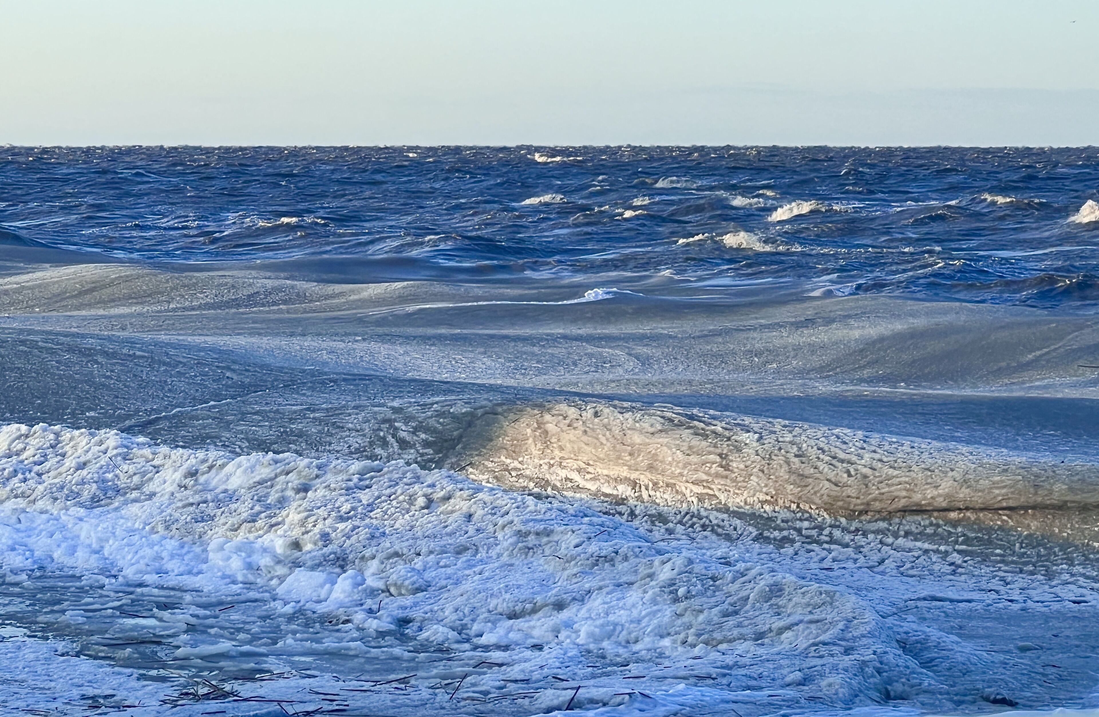A frozen sea with ice and snow.