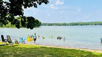 On the beach, sun-loungers