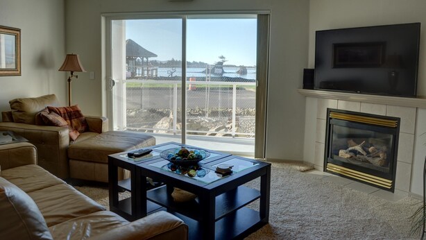 Leilighet, 1 kingsize-seng med sovesofa (Waters Edge 104) | Oppholdsrom