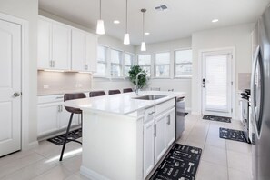 Fridge, microwave, oven, stovetop - Austin Home · Corporate Spacious Luxury Housing (Austin)
