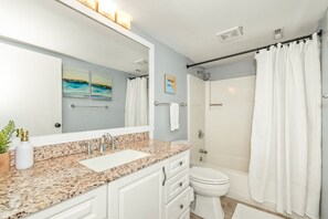 Hair dryer, towels, soap, shampoo