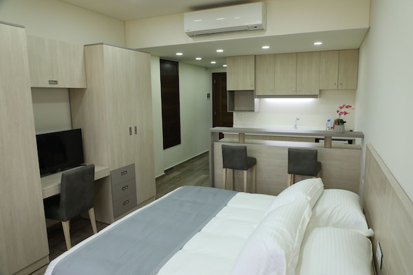 Hypo-allergenic bedding, minibar, in-room safe, iron/ironing board