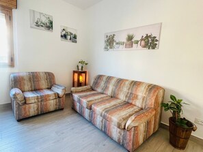 Apartment, 2 Bedrooms, Smoking, Balcony | Living area | Books - Vistagiardino Apartment Reggio Calabria (Reggio Calabria)
