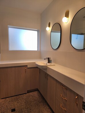 Shower, hair dryer, towels, soap