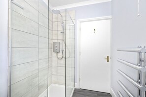 Shower, free toiletries, hair dryer, towels