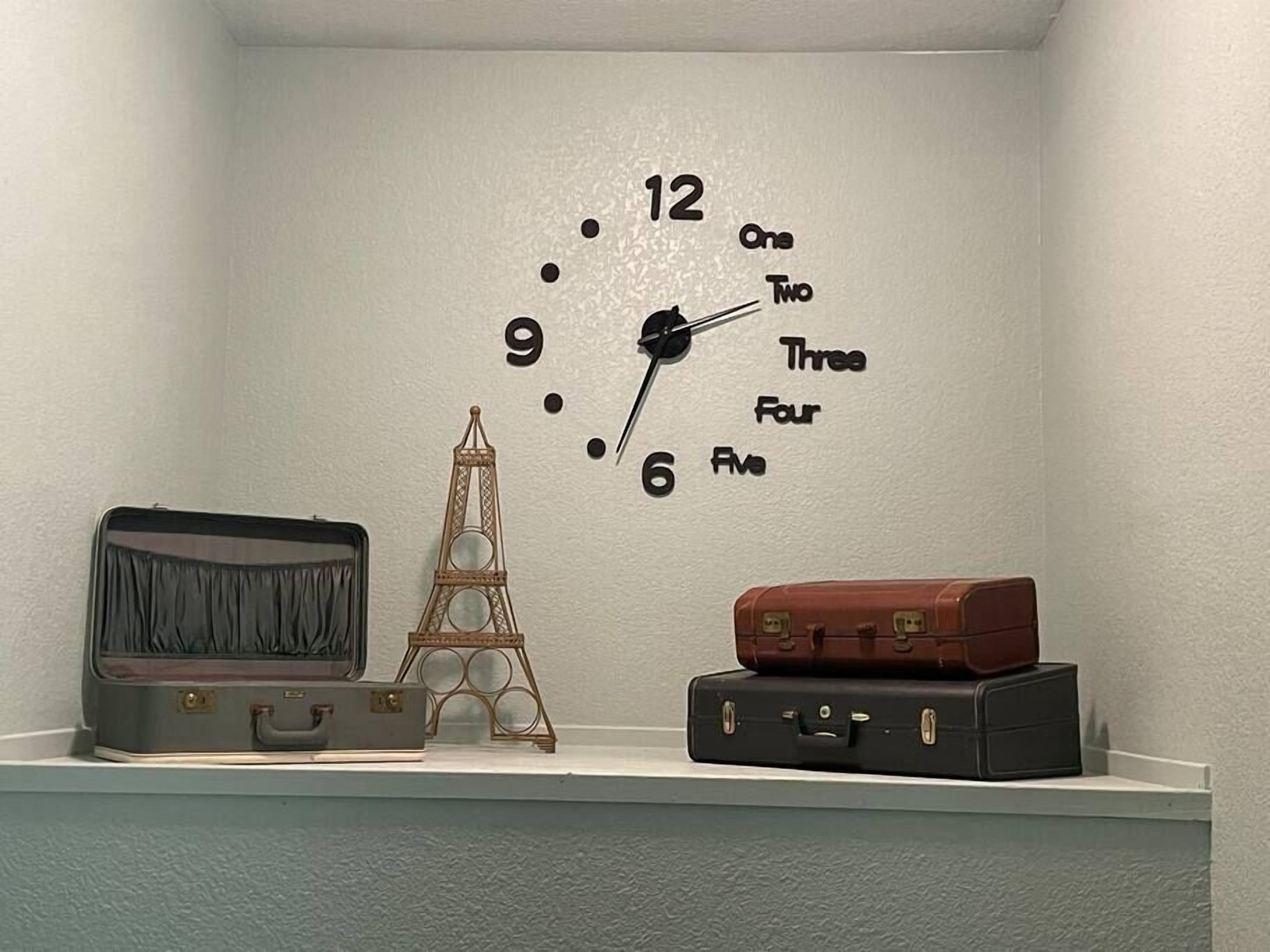 This travel themed Room has a walk in closet, and Private bathroom