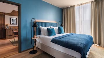 Executive Suite | 1 bedroom, down comforters, pillowtop beds, minibar