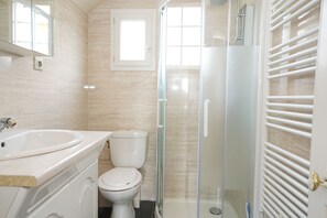 Shower, hair dryer, towels, soap