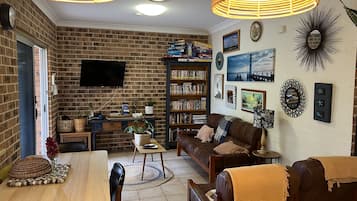 TV, DVD player, books, video library