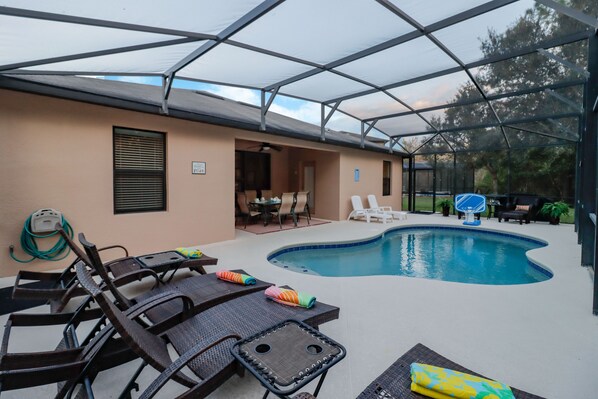 Outdoor pool, pool umbrellas, pool loungers