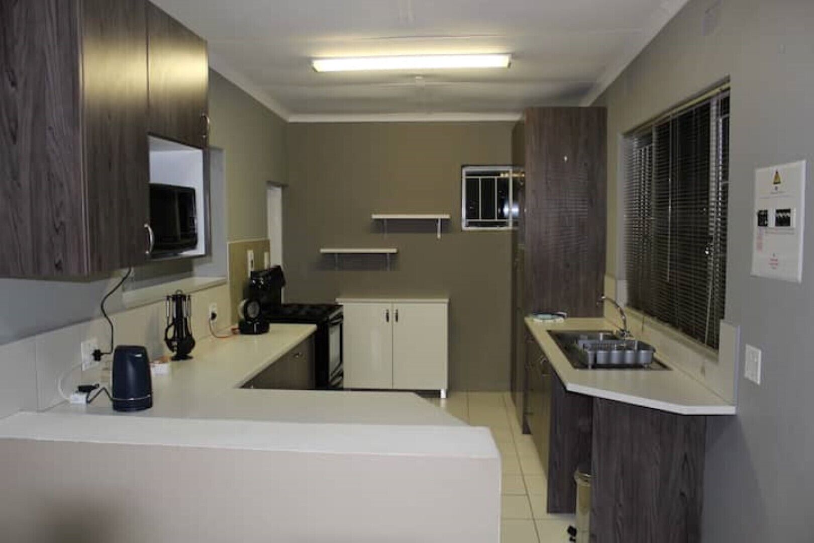 Fridge, oven, stovetop, coffee/tea maker