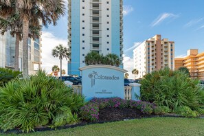 A hotel sign with "The Connades" and "East Beach Boulevard" visible.