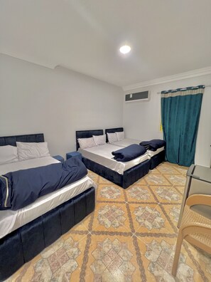 Economy Triple Room | Premium bedding, minibar, free WiFi, bed sheets - Gabry pyramids Inn (Giza)