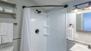 Combined shower/tub, hair dryer, towels, soap