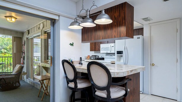 House, 3 Bedrooms | Private kitchen - 5394 Palmetto ~ Villa Upper by Coastal Vacation Properties (Fort Myers Beach)