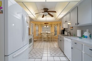 House, 3 Bedrooms | Private kitchen - 14933 Bonaire Circle - Sunset Special by Coastal Vacation Properties (Fort Myers)