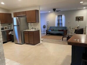 Smart TV, fireplace, books, stereo