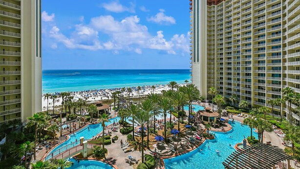 A resort with a pool, beach, and ocean view. - Shores of Panama 719 - Spacious 7th Flr 2 BR Plus Bunks/3 BA with Parking (Panama City Beach)