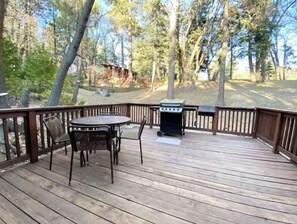Enjoy al fresco dining on the deck with a barbecue grill and comfortable seating for four.