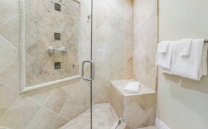 Combined shower/bathtub, hair dryer, towels, soap