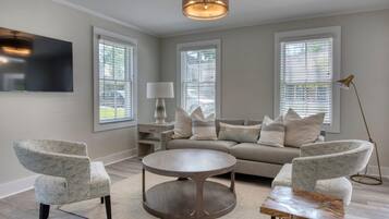 House, Multiple Beds (Sag Harbor Cove Contemporary) | Living room | Flat-screen TV, fireplace