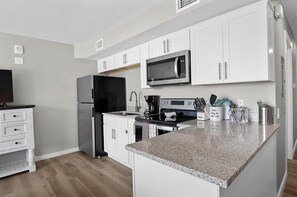 Fridge, microwave, oven, stovetop - Sandcastle Condominiums Unit 131 (Port Aransas)