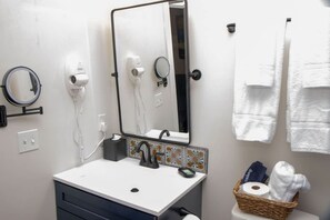 Ducha, secador de pelo