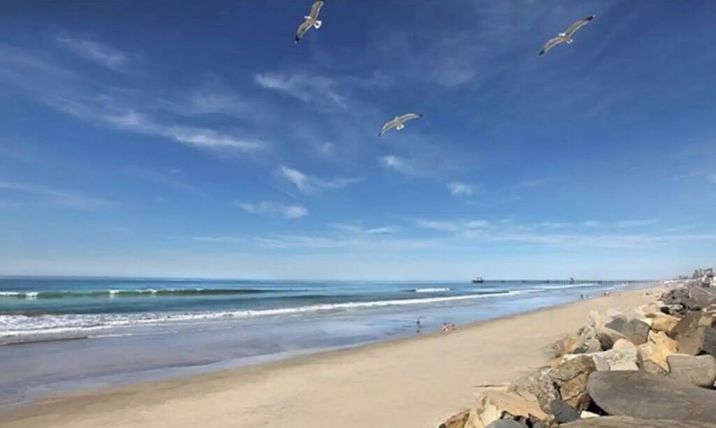 On the beach, sun-loungers, beach towels