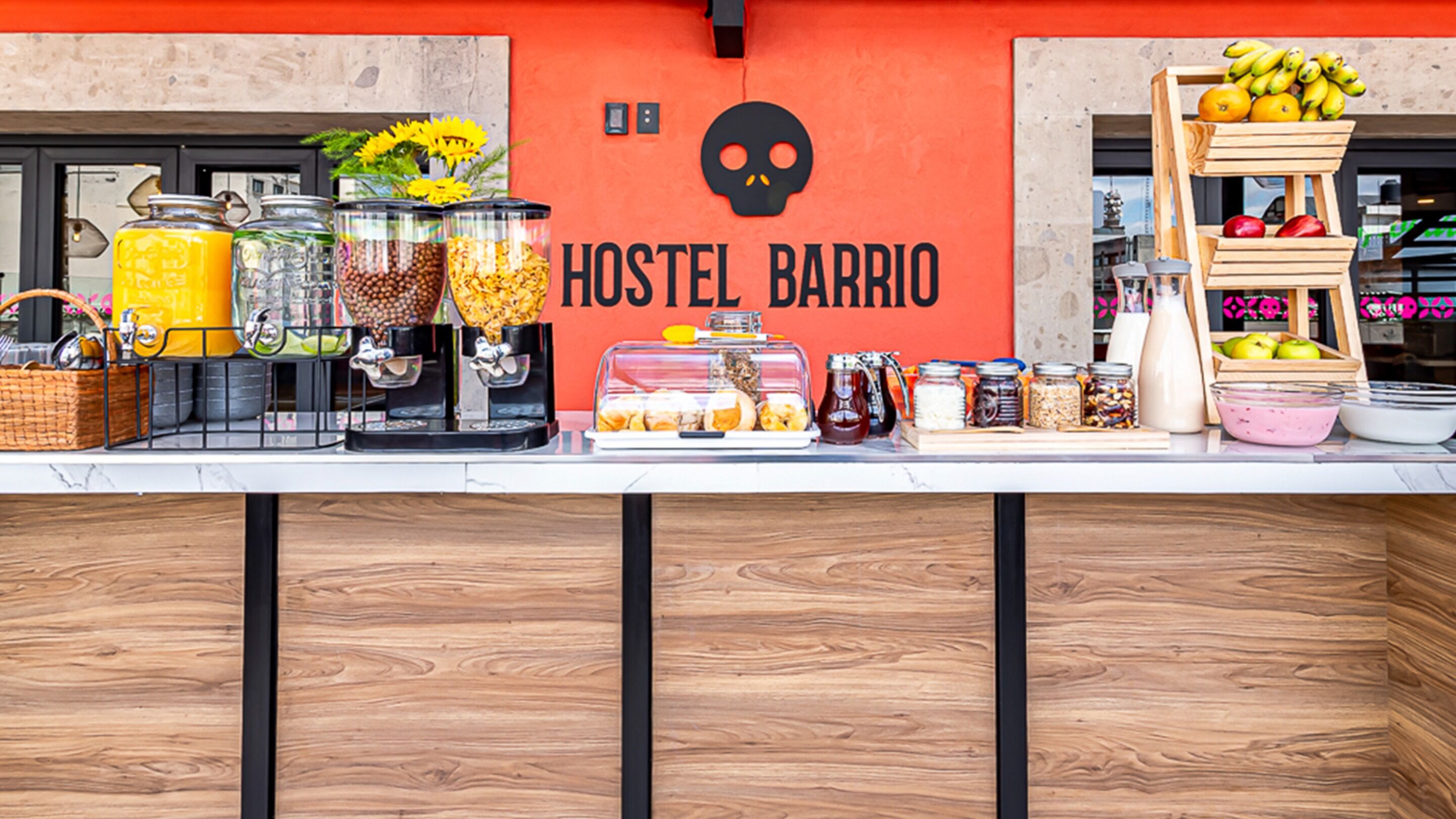 A breakfast bar with various food items and condiments.