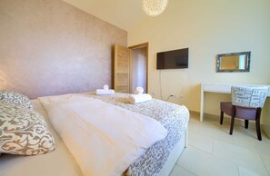 1 dormitorio, tabla de planchar con plancha, wifi gratis y ropa de cama