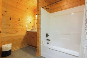 Shower, hair dryer, towels, shampoo