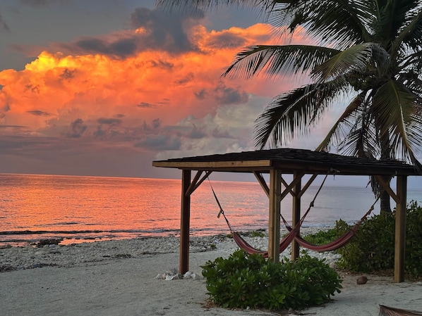 On the beach, sun loungers, beach towels