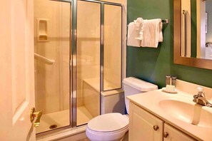 Bathtub, jetted tub, hair dryer, towels