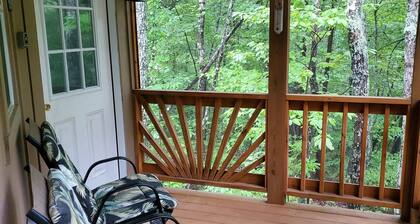 Pet friendly cottage on 17 acre Lake front property with dock and kayak access