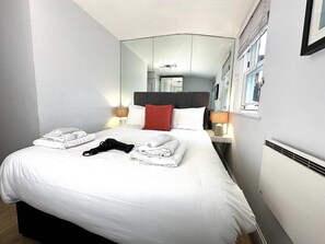 2 slaapkamers, een kluis op de kamer, een strijkplank/strijkijzer, wifi