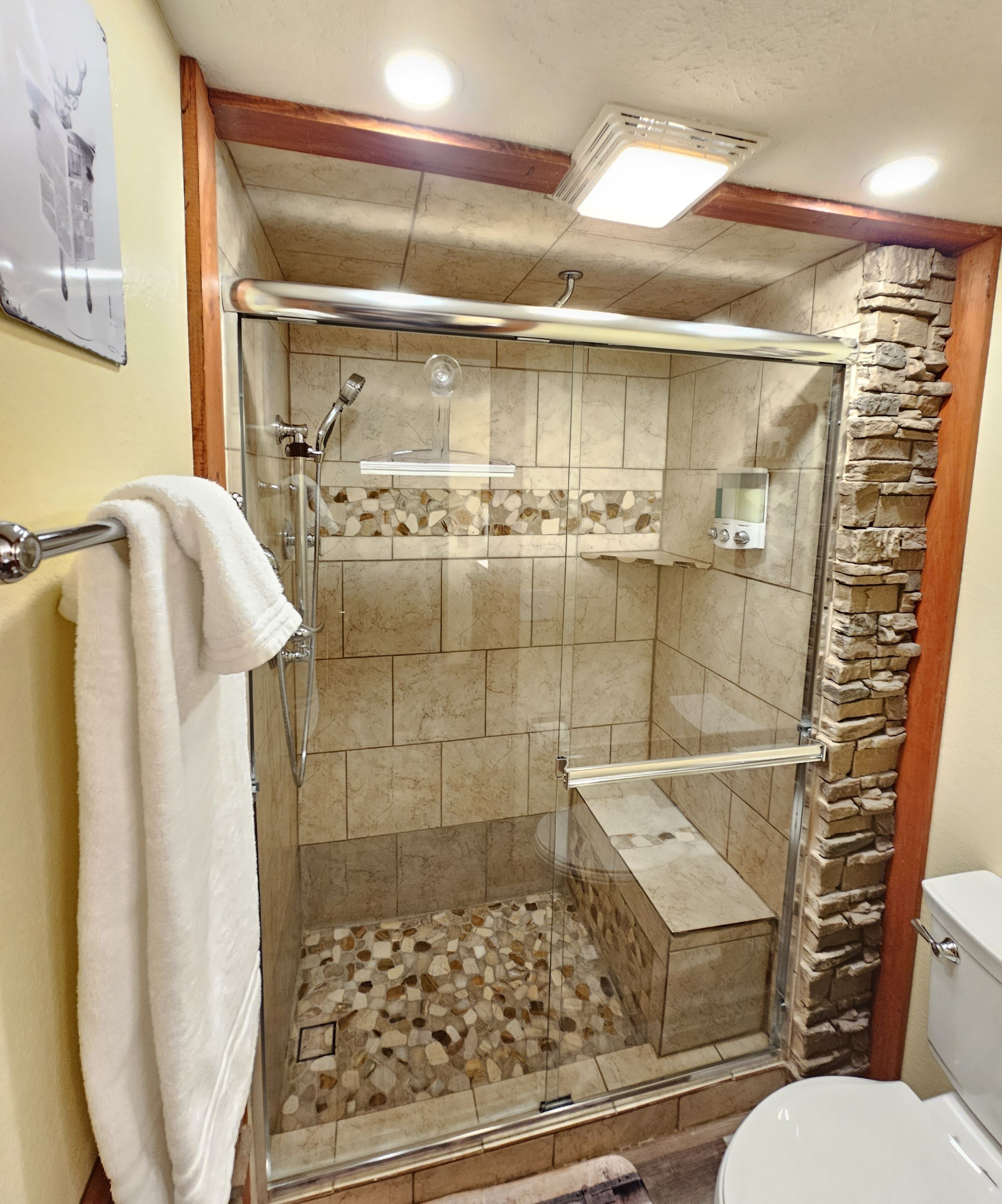 Shower, eco-friendly toiletries, hair dryer, towels
