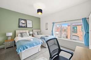 3 bedrooms, desk, iron/ironing board, travel crib