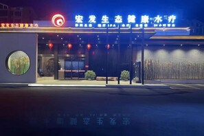 A building with a sign that reads "Zhongfa Lifestyle Health Spa".