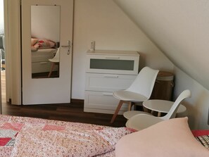 1 bedroom, desk, iron/ironing board, travel crib