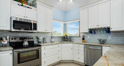 Pet friendly home! Elevator & amazing pool bar with TV, hot tub, deck views!