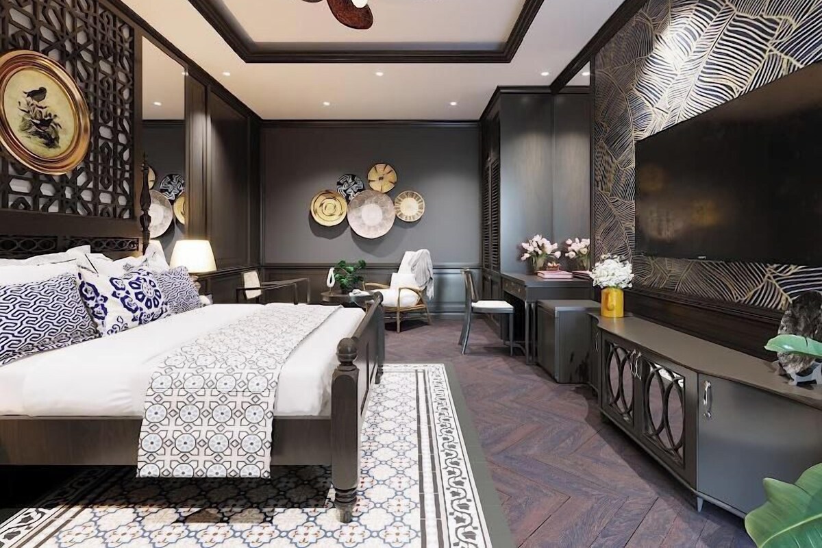Luxe beddengoed, een minibar, een kluis op de kamer, een bureau
