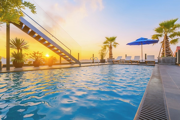 Outdoor pool, sun loungers