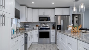 House, 4 Bedrooms | Private kitchen - 1557 Braeburn - Sea Breeze Oasis by Coastal Vacation Properties (Fort Myers)