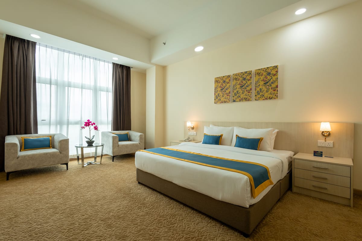Habitación presidencial con 2 camas individuales | 1 habitación, tabla de planchar con plancha, wifi gratis y ropa de cama