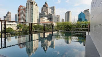 Outdoor pool, open 7:00 AM to 8:00 PM, pool umbrellas, pool loungers