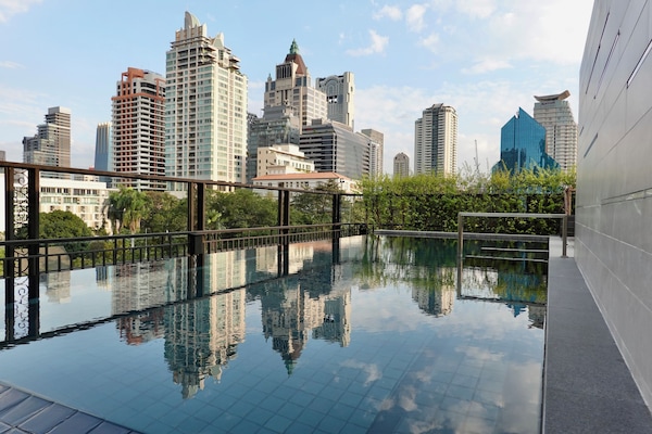 Outdoor pool, open 7:00 AM to 8:00 PM, pool umbrellas, pool loungers