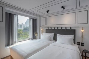 Deluxe Twin Room | Premium bedding, in-room safe, desk, laptop workspace - Passa Hotel Bangkok (Bangkok)